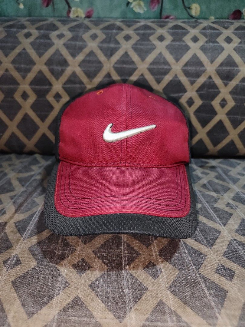 Vintage Red Nike Golf Swoosh Cap (Category: Caps & Hats) located in Quezon City. Submitted by autodrop_ph (Listing ID 1442177405, Image 1). Description: Size: Adjustable Strap Free Size Good Condition..