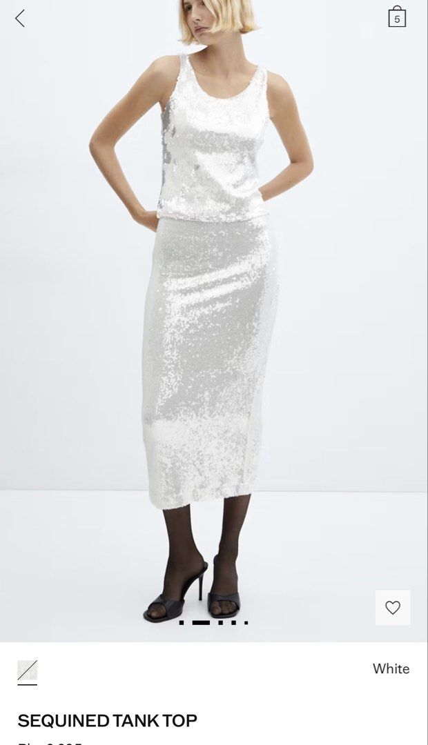 White Sequined Tank Top (Category: Sleeveless) located in Mandaluyong City. Submitted by dlsibal (Listing ID 1442192612, Image 2). Description: - Sparkly white tank top - All-over sequin embellishments - Sleeveless design - Ideal for parties and dressing up outfits - Looks stunning under lights - Versatile: pair with jeans or a skirt - Very eye-catching piece.