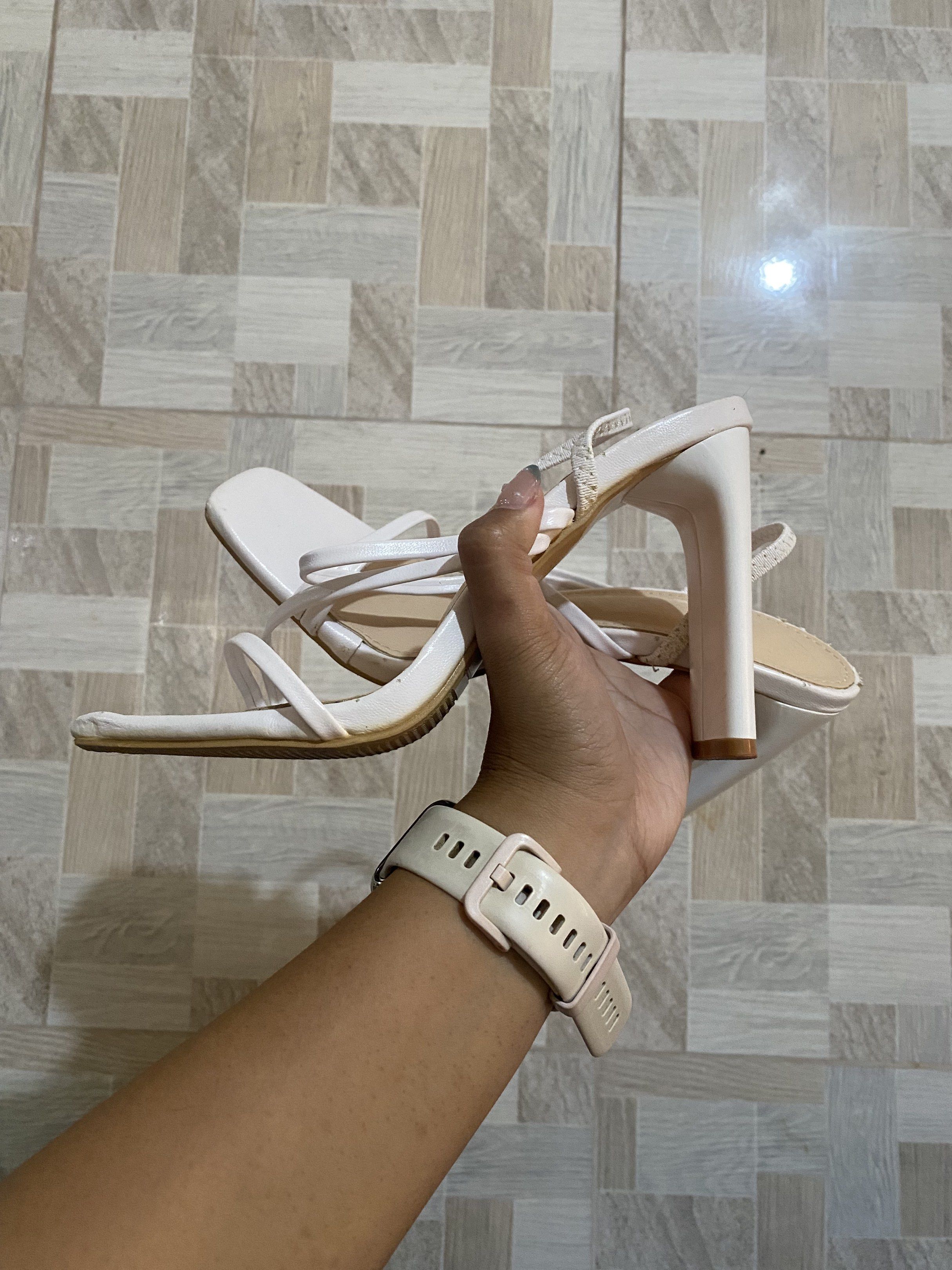 White Strappy Square Toe Block Heels (Category: Heels) located in Cauayan City . Submitted by jclajrob (Listing ID 1442308965, Image 3). Description: - White strappy heels - Size US 6 - Square toe design - Comfortable block heel - Adjustable ankle strap for a secure fit - Versatile for dressing up or down - Ideal for any occasion.