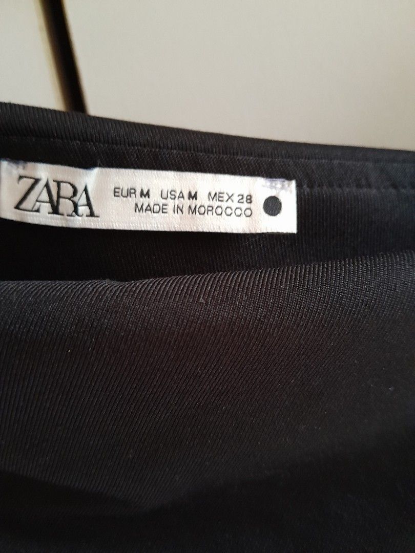 Zara Black Asymmetric Bodysuit (Category: Others Tops) located in Pasay City. Submitted by prelovedgossipgirl (Listing ID 1442183954, Image 2). Description: - never used - snap button MOP: GCASH MOD: JNT.