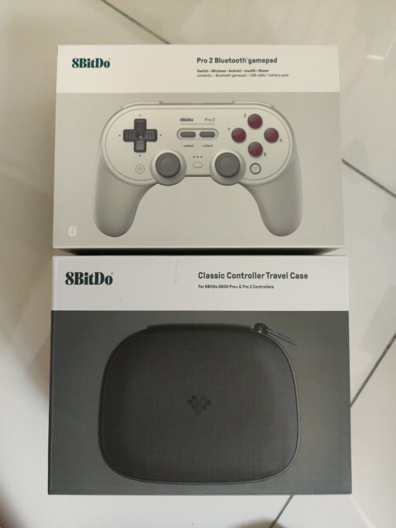 8BitDo Pro 2 Controller (Drift) with Case (Category: Controllers) located in Petaling Jaya. Submitted by raven.cheong (Listing ID 1442427741, Image 2). Description: 8BitDo Pro 2 Controller - Both stick rubber worn off so I wrap 2 black joystick cover - 1 of the joystick has drift Classic Controller Travel Case - perfectly fine Will have the original box as well..