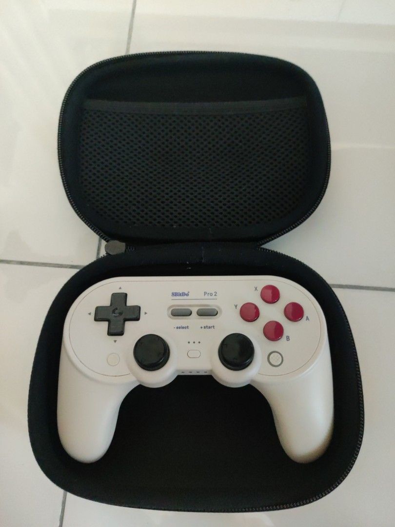 8BitDo Pro 2 Controller (Drift) with Case (Category: Controllers) located in Petaling Jaya. Submitted by raven.cheong (Listing ID 1442427741, Image 1). Description: 8BitDo Pro 2 Controller - Both stick rubber worn off so I wrap 2 black joystick cover - 1 of the joystick has drift Classic Controller Travel Case - perfectly fine Will have the original box as well..