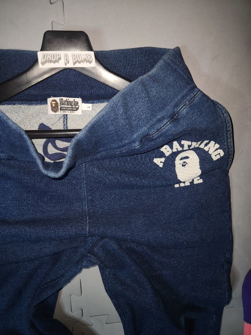 A Bathing Ape BAPE Denim Sweatpants Size L (Category: Joggers) located in Baguio. Submitted by dab.garms (Listing ID 1442459885, Image 3). Description: Selling a pair of BAPE denim sweatpants. Features the classic BAPE logo on the thigh. Elastic waistband and cuffs. Size L. Great for casual wear. Check out the photos for details. BAPE SWEATPANTS Item Details: Large on Tag Measurements ( inches ): Waistline(Width): 34 - 36 Waist to Leg Opening(Len