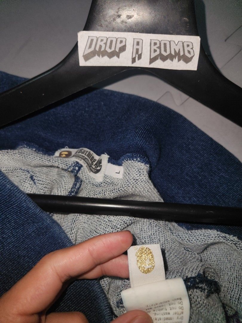 A Bathing Ape BAPE Denim Sweatpants Size L (Category: Joggers) located in Baguio. Submitted by dab.garms (Listing ID 1442459885, Image 2). Description: Selling a pair of BAPE denim sweatpants. Features the classic BAPE logo on the thigh. Elastic waistband and cuffs. Size L. Great for casual wear. Check out the photos for details. BAPE SWEATPANTS Item Details: Large on Tag Measurements ( inches ): Waistline(Width): 34 - 36 Waist to Leg Opening(Len