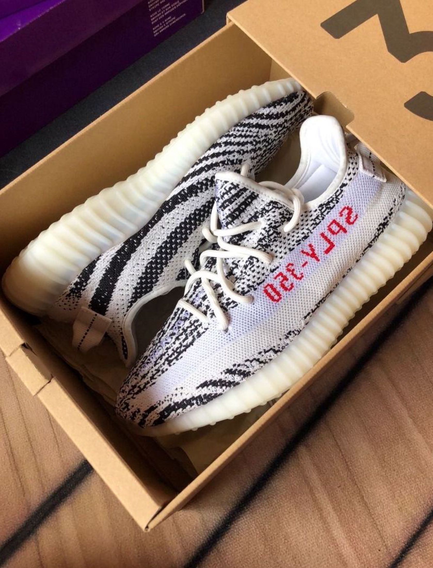 Adidas originals Yeezy Boost 350 V2 Zebra Shoes (Category: Sneakers) located in Singapore. Submitted by bravewolf (Listing ID 1442367350, Image 2). Description: 💎 Adidas 👟 Adidas originals Yeezy Boost 350 V2 Zebra Shoes 🆕 Brand New 🚚 Free ship J&T/Ninja Van 📸 3-day confirm 💰 COD ✉️ Chat for inquiries.