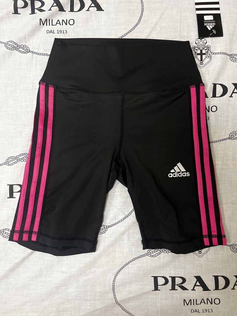 Adidas Techfit Compression Biker Shorts Pink Stripes Size L (Category: Activewear) located in Cavite. Submitted by jedecluttering (Listing ID 1442440497, Image 1). Description: - Black Adidas biker shorts with pink stripes - Features Techfit Compression and ClimaCool technology - Size: Large (L) - Made in the Philippines - Ideal for workouts or everyday casual wear.