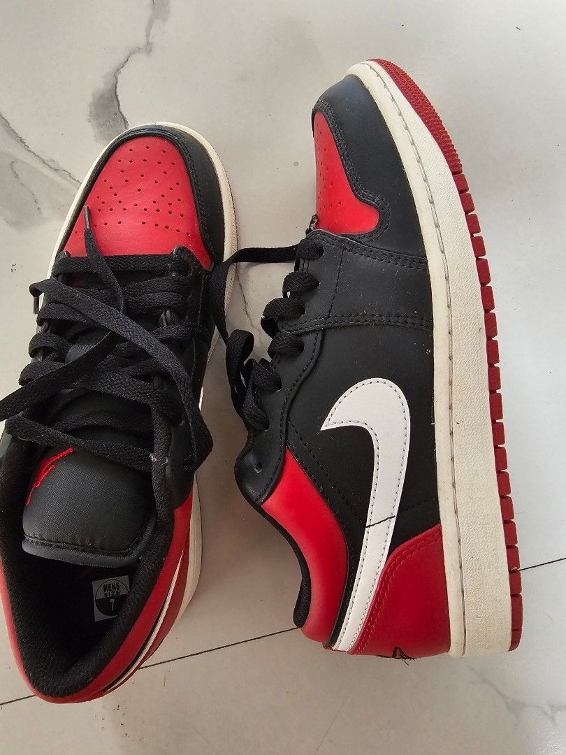 Air Jordan 1 Low (Category: Sneakers) located in Norzagaray. Submitted by somethingpretty_ (Listing ID 1442351945, Image 2). Description: - Classic Air Jordan 1 Low - Iconic Chicago colorway (Black, Red, White) - Perfect for everyday wear - Includes original box - never been used - slightly negotiable - rfs: too many sneakers.