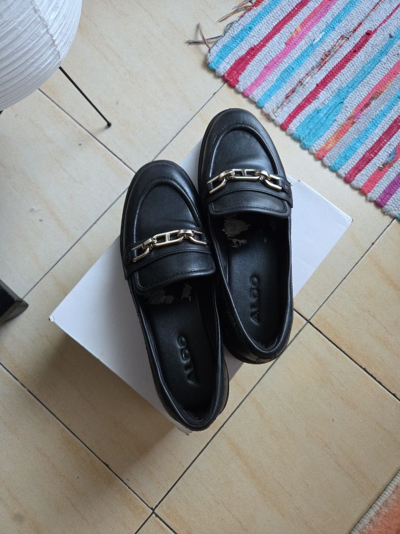 ALDO Black Chain Detail Loafers (Category: Loafers) located in Makati City. Submitted by shoppreloved_ (Listing ID 1442371492, Image 1). Description: BARELY used cos it's too big on me. but outer synthetic leather is starting to come off due to time in storage. No damage in the sole area / inside the shoes - the gray thing you see in the sole is leftover sticker paper from orig packaging shipping to be arranged by buyer. pls pick up in Makati. - 