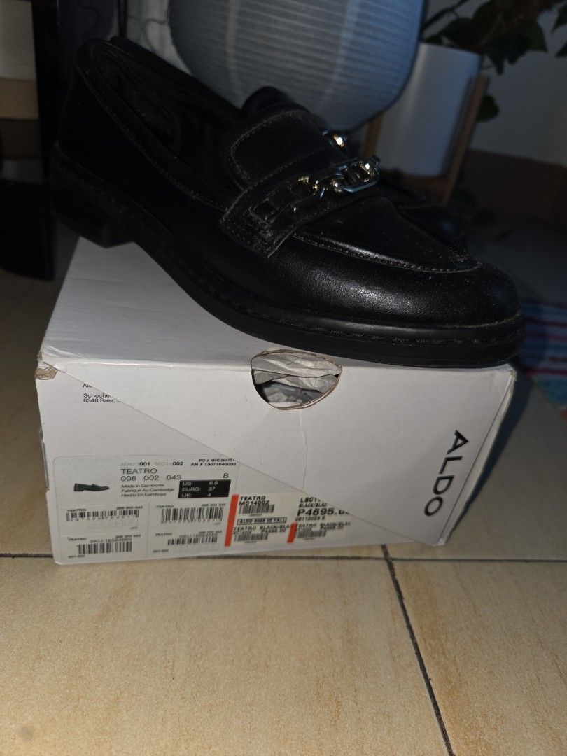 ALDO Black Chain Detail Loafers (Category: Loafers) located in Makati City. Submitted by shoppreloved_ (Listing ID 1442371492, Image 3). Description: BARELY used cos it's too big on me. but outer synthetic leather is starting to come off due to time in storage. No damage in the sole area / inside the shoes - the gray thing you see in the sole is leftover sticker paper from orig packaging shipping to be arranged by buyer. pls pick up in Makati. - 