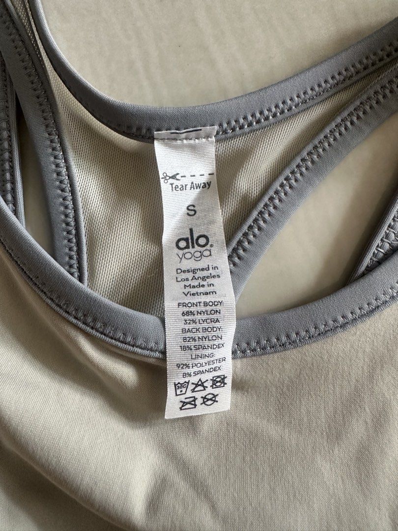 Alo Yoga Sports Bra Size S (Category: Activewear) located in Singapore. Submitted by bubblewrapped (Listing ID 1442398965, Image 3). Description: Alo Yoga sports bra, size S. Light beige with grey trim and strappy back. Great for workouts..