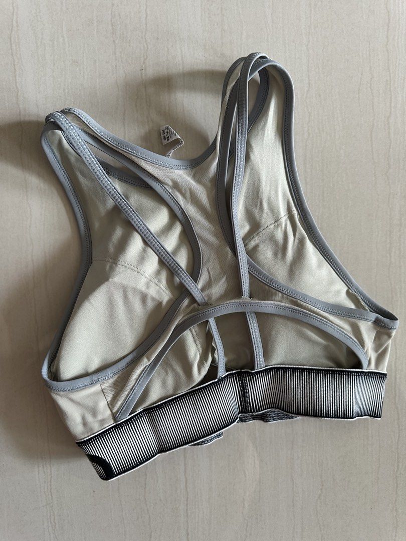 Alo Yoga Sports Bra Size S (Category: Activewear) located in Singapore. Submitted by bubblewrapped (Listing ID 1442398965, Image 2). Description: Alo Yoga sports bra, size S. Light beige with grey trim and strappy back. Great for workouts..