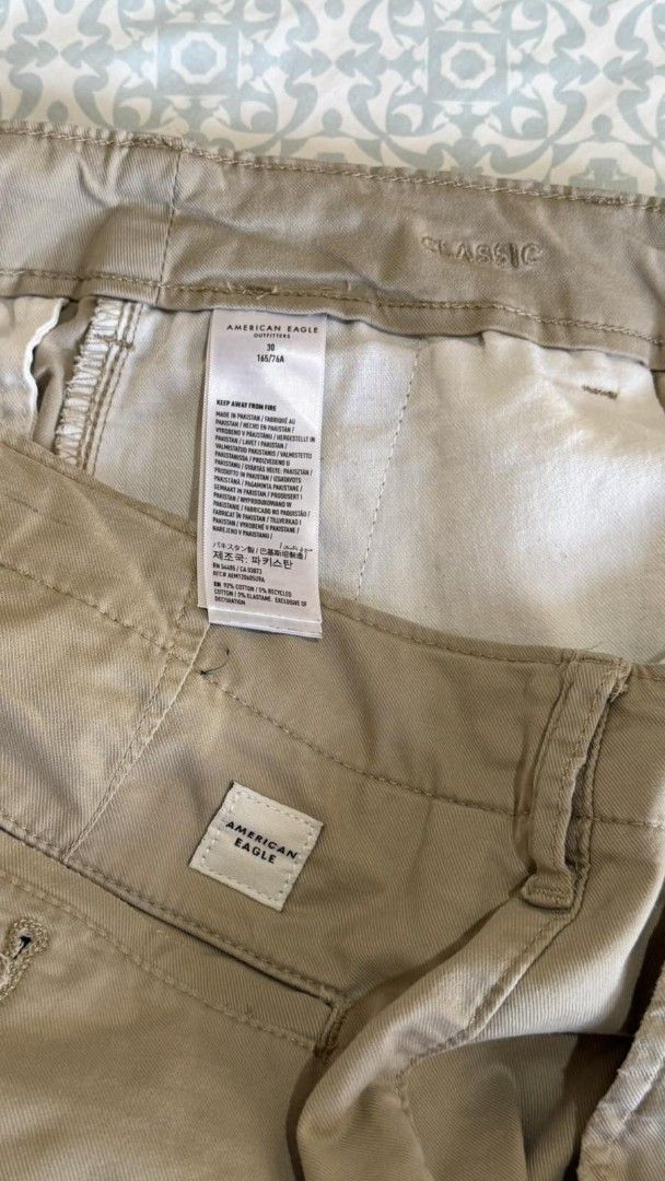 American Eagle Shorts Mens - Size 30 (Category: Shorts) located in Manila. Submitted by d0304 (Listing ID 1442478495, Image 3). Description: - Brand: American Eagle - Color: Khaki - Style: Chino Shorts - Size: US men 30 - Pockets: Two back pockets with button closure - Fit: Comfortable, classic - Occasion: Casual, everyday wear.