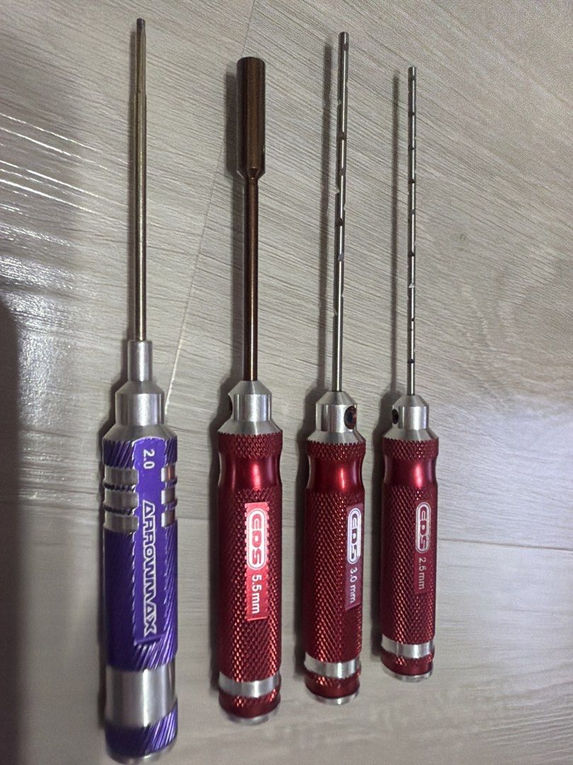 Arrowmax & EDS Hex Screwdriver Set (Category: Home Improvement Tools & Accessories) located in Singapore. Submitted by inring (Listing ID 1442483708, Image 1). Description: Arrowmax 2.0mm EDS 5.5mm, EDS rimmer 3.0mm, 2.5mm - All feature aluminum handles Self collection Price firm .