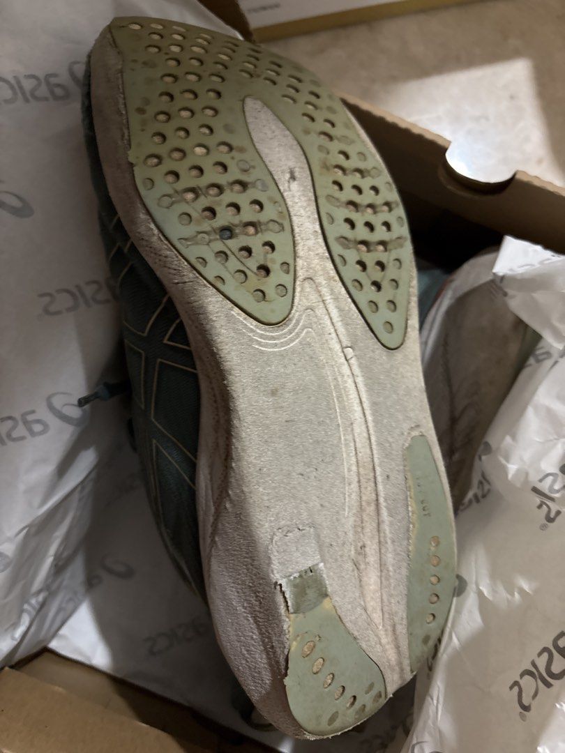 ASICS Gel Nimbus 25 Running Shoes (Category: Sneakers) located in Singapore. Submitted by ahmamalee (Listing ID 1442456879, Image 3). Description: - ASICS Gel Nimbus 25 Running Shoes - Size woman : US 8 (EUR 39.5) - Color: Teal with Gold Accents - Condition: Used, with signs of wear on soles and uppers - Includes: Box not original for this shoe - Ideal for your next run!.