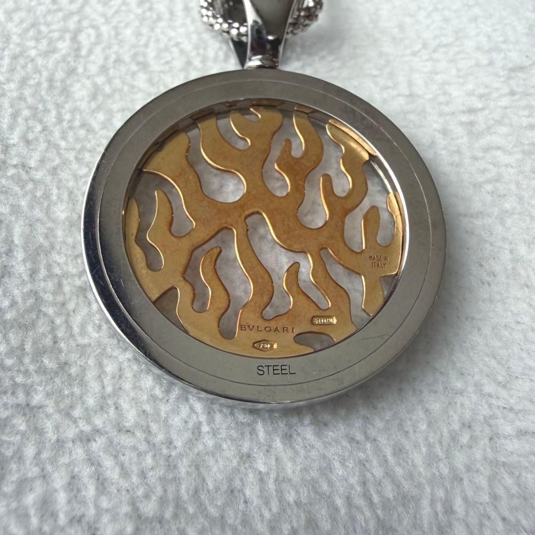 Authentic BVLGARI Tondo Fire Pendant (Category: Necklaces) located in General Trias. Submitted by japan_secondhand_products (Listing ID 1442542799, Image 2). Description: This is a pendant from BVLGARI's Tondo Fire series. The combination of gold and stainless steel creates a striking design. This item is unisex. Minor scratches (no noticeable damage) No accessories included (main unit only).