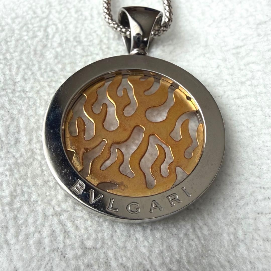 Authentic BVLGARI Tondo Fire Pendant (Category: Necklaces) located in General Trias. Submitted by japan_secondhand_products (Listing ID 1442542799, Image 1). Description: This is a pendant from BVLGARI's Tondo Fire series. The combination of gold and stainless steel creates a striking design. This item is unisex. Minor scratches (no noticeable damage) No accessories included (main unit only).