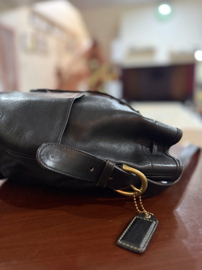 Authentic Coach Vintage Bag (Category: Luxury Bags & Wallets) located in Quezon City. Submitted by annefaulan (Listing ID 1442529704, Image 3). Description: Selling my preloved Authentic Vintage Coach bucket bag. Super genuine leath at amoy leather. Rank A and you can design it with keychains or scarfs. This is a really on the go bag, light weight leather & spacious inside. PM me if interested 💌 What you see is what you get! Can ship via Lalamov
