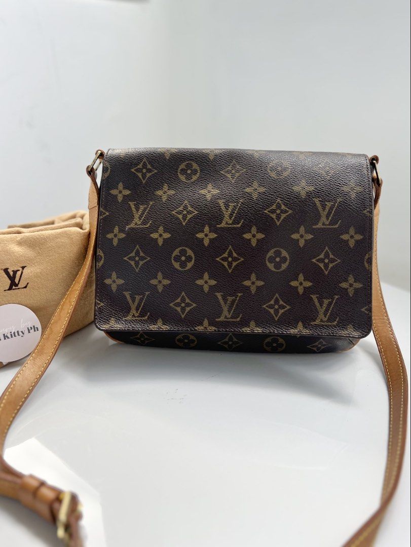 Authentic preloved LV Musette tango sling bag (Category: Luxury Bags & Wallets) located in San Pablo. Submitted by misskittyph (Listing ID 1442366142, Image 2). Description: M.onogram M.usette tango crossbody bag ▪️29k only . Made in Spain with datecode LM0093 With dustbag condition 8.5/10 Moderate patina at strap and trim and hardware; small leather strap trim has softened from use, with tolerable crack on upper layer Layaway options available �