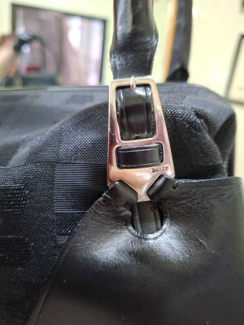 Bally Handbag (Category: Luxury Bags & Wallets) located in Rizal. Submitted by dims05 (Listing ID 1442364115, Image 2). Description: Classic Bally handbag in black with silver-tone hardware. A timeless piece that's perfect for work, meetings, or everyday use. Spacious interior and structured design that never goes out of style. Preloved and well-kept, with normal signs of use. Please refer to the photos for the actual condition. - Classic black s
