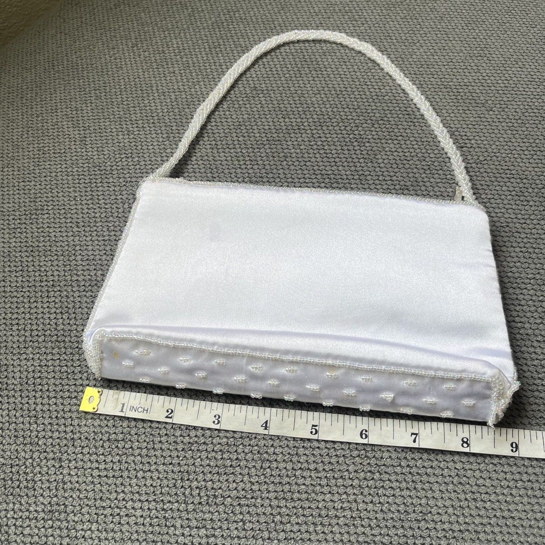 Beaded White Japan Party Shoulder Bag (Category: Shoulder Bags) located in Silang. Submitted by f4iry4rch1ve (Listing ID 1442440698, Image 3). Description: Beaded White Japan Party Shoulder Bag 650 php+ sf Condition: 9.5/10, tiny orange stain sa bottom Dimensions: view the pictures above -from Japan -1 compartment - actual photos Note: Colors may vary due to lighting Please message me for shipping and payment method... .
