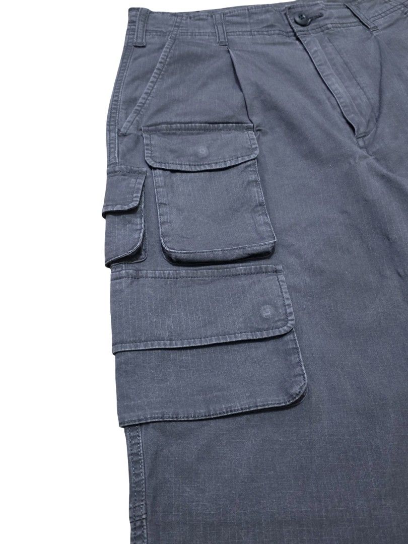 Beams Multipocket Cargo Pants (Category: Trousers) located in Angeles City. Submitted by recyclecenter (Listing ID 1442506236, Image 2). Description: Beams Multipocket Cargo Pants Charcoal Size S fits 30 inch waist Waist 15 inches Rise 12.5 inches Inseam 27 inches Outseam 37.5 inches Leg opening 8 inches - ripstop material - 2 slant pockets ,2 back pockets - 3 hip pockets on the right, 1 left cargo pocket - hem adjusters.