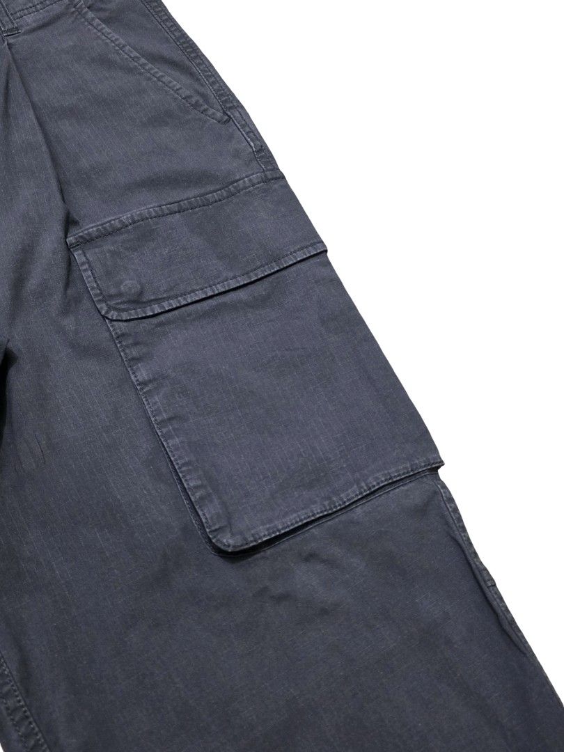 Beams Multipocket Cargo Pants (Category: Trousers) located in Angeles City. Submitted by recyclecenter (Listing ID 1442506236, Image 3). Description: Beams Multipocket Cargo Pants Charcoal Size S fits 30 inch waist Waist 15 inches Rise 12.5 inches Inseam 27 inches Outseam 37.5 inches Leg opening 8 inches - ripstop material - 2 slant pockets ,2 back pockets - 3 hip pockets on the right, 1 left cargo pocket - hem adjusters.