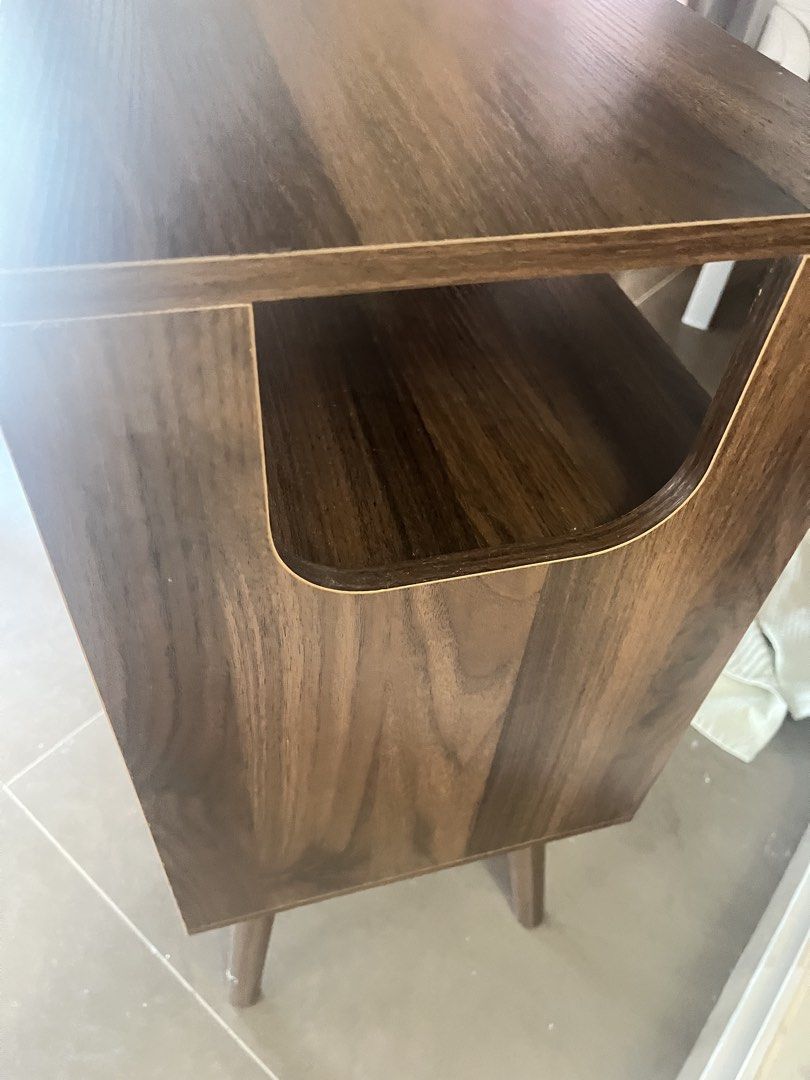 Bedside table (Category: Shelves, Cabinets & Racks) located in Singapore. Submitted by lialia28 (Listing ID 1442524510, Image 3). Description: Bedside table - dimensions 11.42”D x 15.35”W x 24.45”H Engineered wood Walnut brown. Embrace the farmhouse touch: A classic rattan faucet, this nightstand gives off a modern touch in your bedroom. With a row insert makes it more practical, the atmosphere lamp is a good addition to the fun of life, it can a