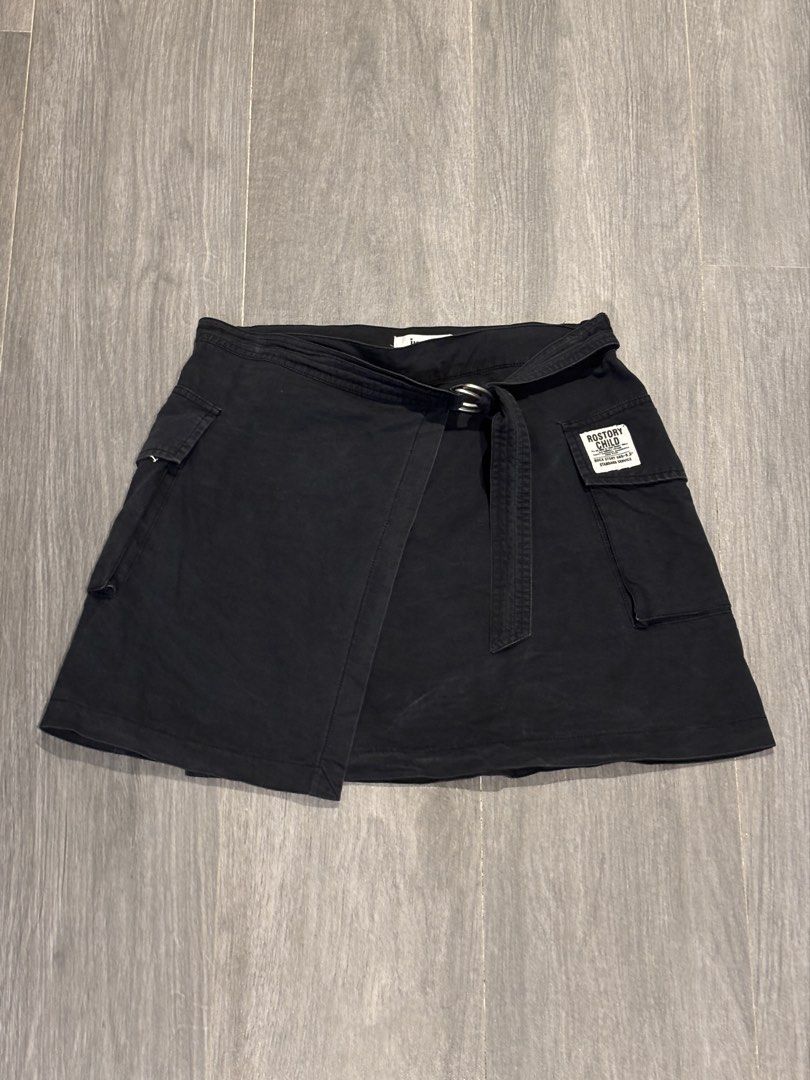Black Cargo Wrap Skirt with Belt (Category: Skirts) located in Quezon City. Submitted by soapstore (Listing ID 1442440948, Image 1). Description: *Seller’s fav!! RFS decluttering - S-M - L: 39cm - W: 72cm - no ww.