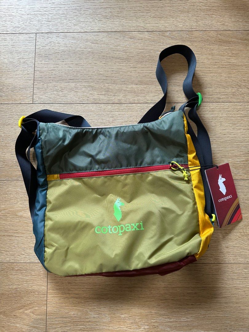 BNWT Cotopaxi Taal Convertible Tote - Del Día Green Olive (Category: Sling Bags) located in Singapore. Submitted by happysunseeds (Listing ID 1442401916, Image 1). Description: Can use as sling or backpack Retails at US$60 before shipping .