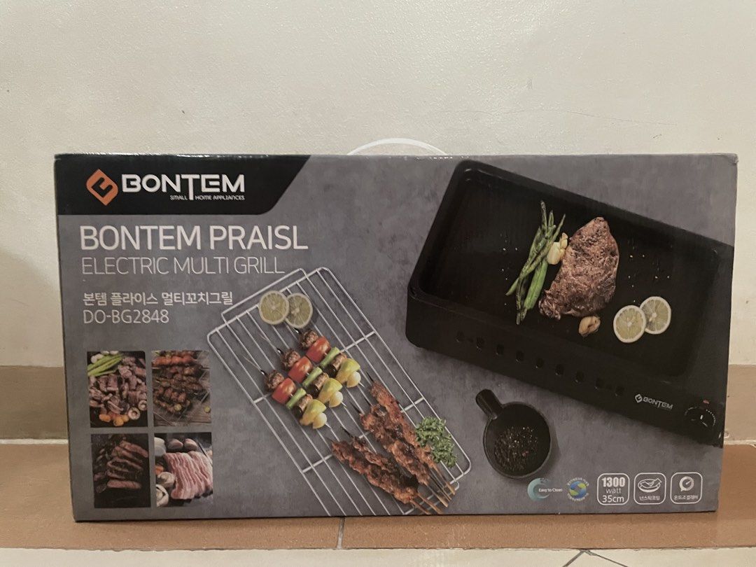 Bontem Praisl Electric Multi Grill DO-BG2848 (Category: Cookware & Accessories) located in Quezon City. Submitted by pattb (Listing ID 1442525836, Image 1). Description: - Bontem Electric Multi Grill - Model: DO-BG2848 - Power: 1300 Watts - Size: 35cm - Ideal for grilling steaks, skewers, and various dishes - can ask for more pictures through chat - Easy to clean - Brand new, sealed in box.