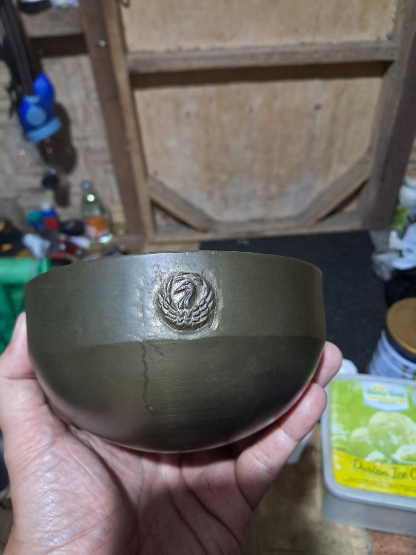 Brass Singing Bowl with Intricate Design (Category: Dinnerware & Cutlery) located in Davao. Submitted by rbjuvyreyn18879 (Listing ID 1442425076, Image 3). Description: - Crafted from quality brass - Features a beautiful, intricate design on the bottom - Has a satisfying weight - Emits a clear and resonant sound when played - Ideal for meditation, mindfulness, or as a decorative piece - 2pcs.