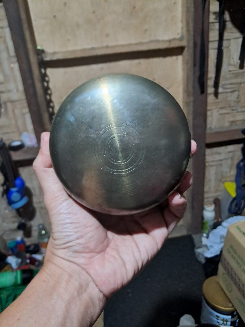 Brass Singing Bowl with Intricate Design (Category: Dinnerware & Cutlery) located in Davao. Submitted by rbjuvyreyn18879 (Listing ID 1442425076, Image 2). Description: - Crafted from quality brass - Features a beautiful, intricate design on the bottom - Has a satisfying weight - Emits a clear and resonant sound when played - Ideal for meditation, mindfulness, or as a decorative piece - 2pcs.
