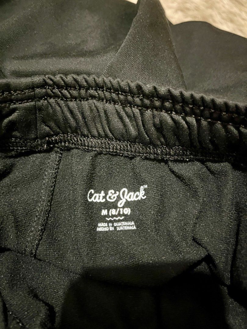 Cat & Jack Black Jogger Pants Size M (8/10) (Category: Babies & Kids Fashion) located in Pasig City. Submitted by samotsari (Listing ID 1442509212, Image 2). Description: - Brand: Cat & Jack - Color: Black - Style: Jogger Pants - Size: Medium (fits kids 8-10) - Features: Elastic waistband for comfort - Origin: Made in Guatemala - Ideal for: Everyday wear, sports, playtime.