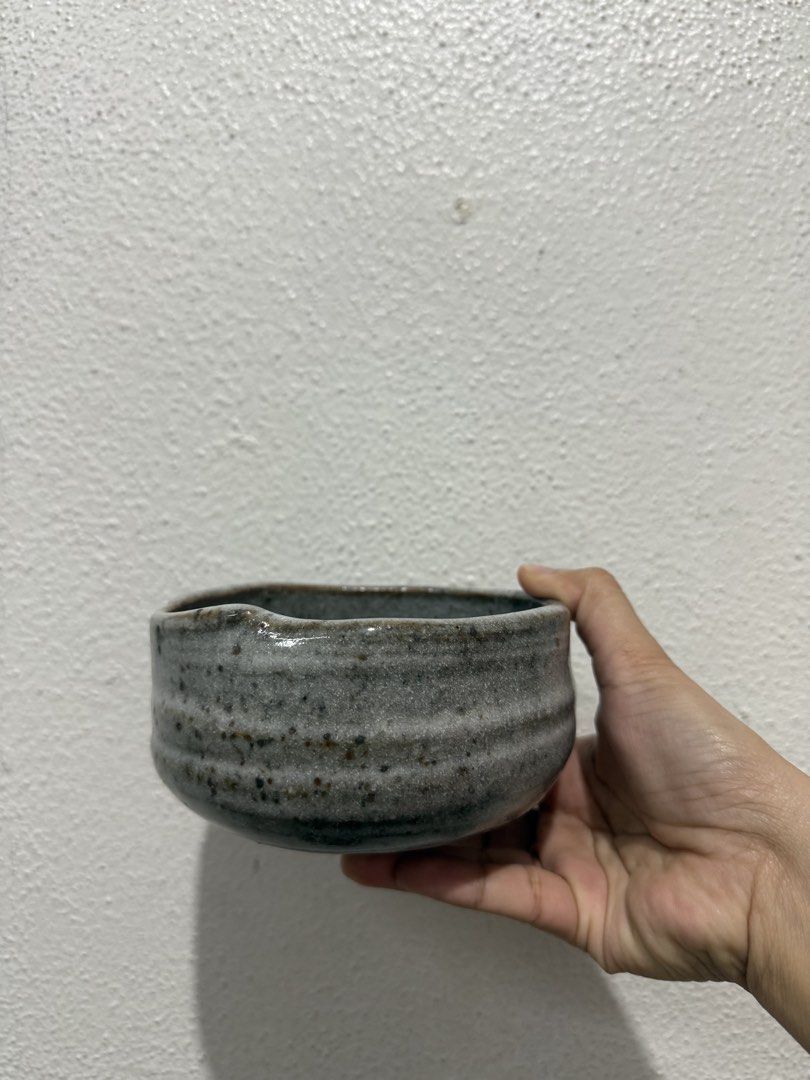Chawan for Matcha, Matcha bowl (Category: Other Kitchenware & Tableware) located in Marikina City. Submitted by ellapam (Listing ID 1442501200, Image 3). Description: - Handmade ceramic bowl - Rustic grey glaze with textured exterior - Ideal for preparing matcha or as a small serving dish - Unique, one-of-a-kind piece.