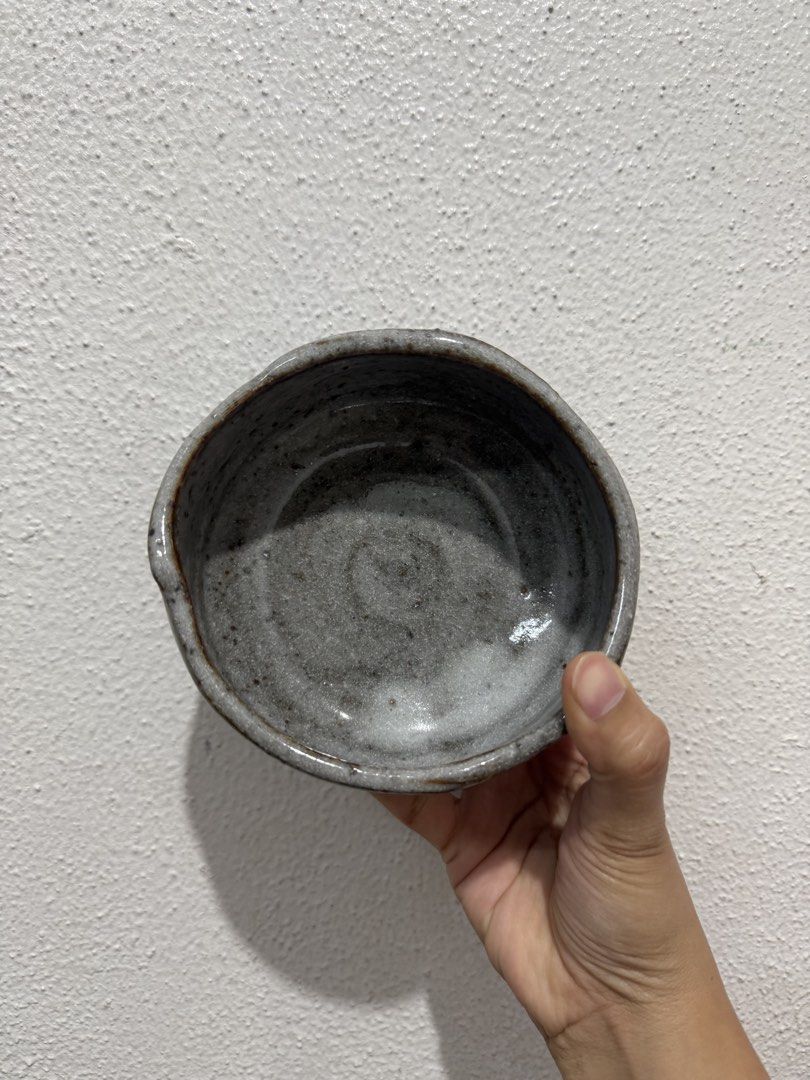 Chawan for Matcha, Matcha bowl (Category: Other Kitchenware & Tableware) located in Marikina City. Submitted by ellapam (Listing ID 1442501200, Image 2). Description: - Handmade ceramic bowl - Rustic grey glaze with textured exterior - Ideal for preparing matcha or as a small serving dish - Unique, one-of-a-kind piece.
