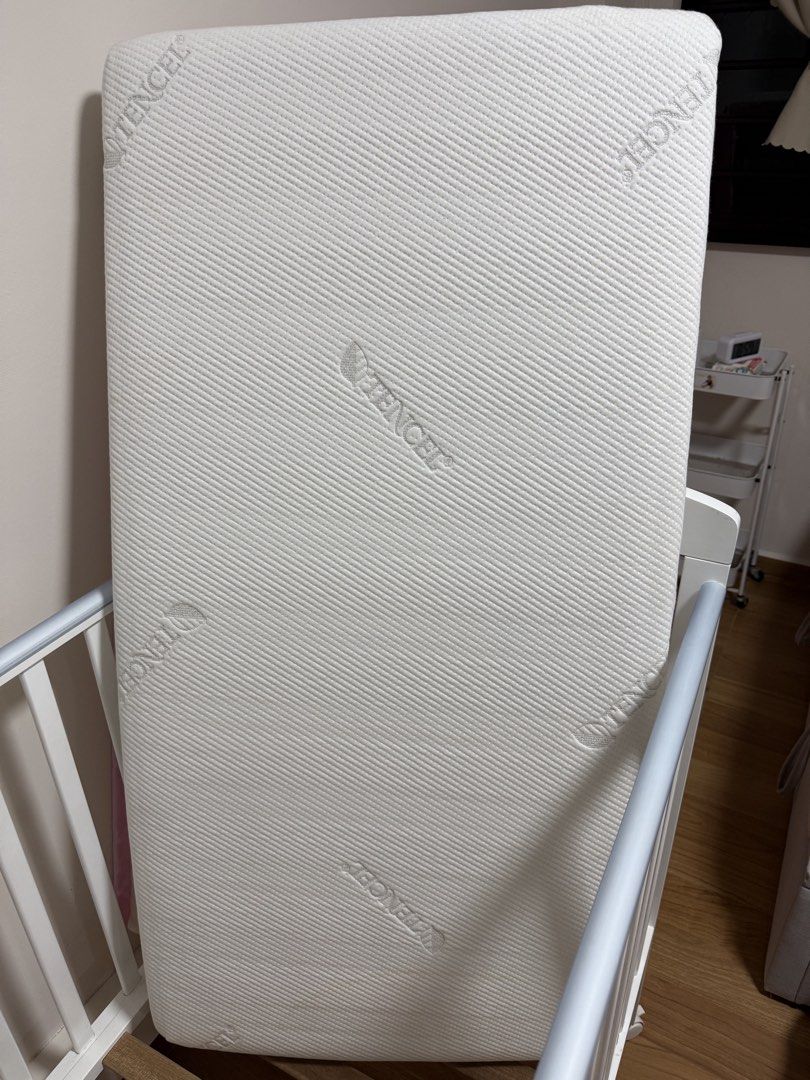 Cheeky Bonbon Baby Cot Mattress with Tencel Fabric (Category: Cots & Cribs) located in Singapore. Submitted by seaviewsg (Listing ID 1442474398, Image 2). Description: - Cheeky Bonbon baby cot mattress - Soft & breathable Tencel fabric cover - Fits standard cot sizes - Always used with a mattress protector - No stains or tears - Clean and ready for a new home.