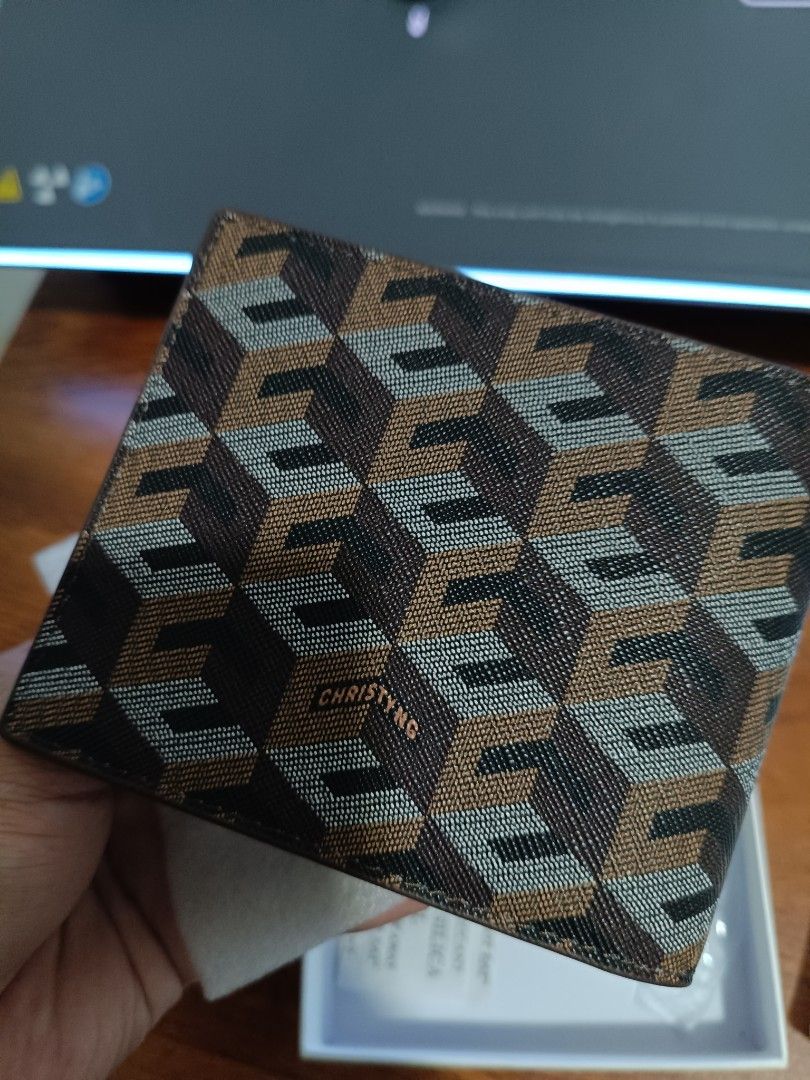Christy Ng Mateo Wallet Walnut Brown (Category: Wallets & Card holders) located in Manila. Submitted by getthiztodymoonfhph (Listing ID 1442526220, Image 1). Description: Christy Ng Mateo wallet in Walnut Brown. Features the brand's signature geometric pattern. Interior is a classic brown leather. Comes with original box and tags. Bought recently, never used..