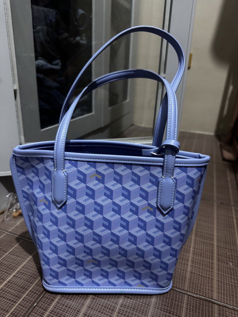Christy Ng Russo in Periwinkle Mini (Category: Tote Bags) located in Caloocan City. Submitted by maimaibtsta0 (Listing ID 1442530906, Image 2). Description: Single compartment Comes with detachable pouch 7.8” (L) x 7.8” (H) x 4.4” (W) Can fit an iPad Mini or Kindle (top exposed) Can fit iPhone Pro Max Bought it last January 2026.