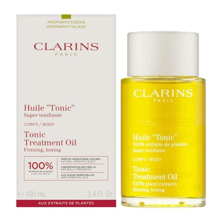 Clarins Tonic Treatment Oil Firming Toning 100ml (Category: Body Care) located in Singapore. Submitted by glossaria (Listing ID 1442479877, Image 1). Description: - Clarins Tonic Treatment Oil - 100ml bottle - Helps with firming and toning - Made with 100% plant extracts and essential oils - Natural aromatic scent - Ideal addition to your skincare routine.