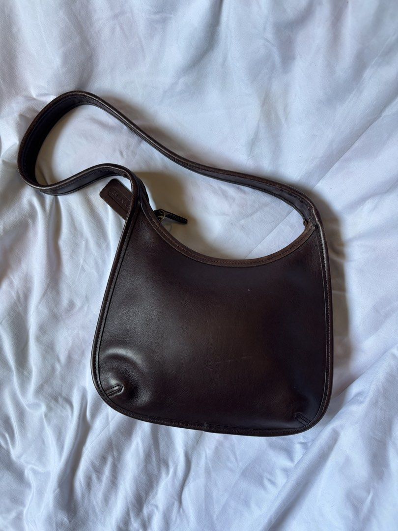 Coach 9020 Mini Ergo (Category: Luxury Bags & Wallets) located in Calamba. Submitted by chrysanthemums.mnl (Listing ID 1442369925, Image 2). Description: Never been used. Color is Mahogany. Payment first, or payment upon arrival of lalamove rider. J&T shipping, free local shipping. Cleaned and already conditioned with Bick 4. .