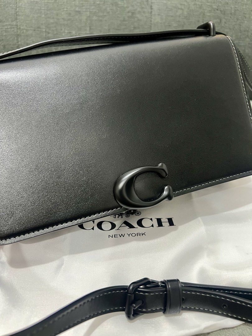 Coach Bandit Shoulder Bag (Category: Luxury Bags & Wallets) located in Las Pinas. Submitted by djcarla14 (Listing ID 1442462873, Image 3). Description: - Coach Bandit shoulder bag - Color: Black leather - Used twice - Bought 50k at Coach Powerplant - Comes with original dust bag - Multiple interior compartments for organization - Clean inside and out - Free lifetime cleaning at all Coach stores .