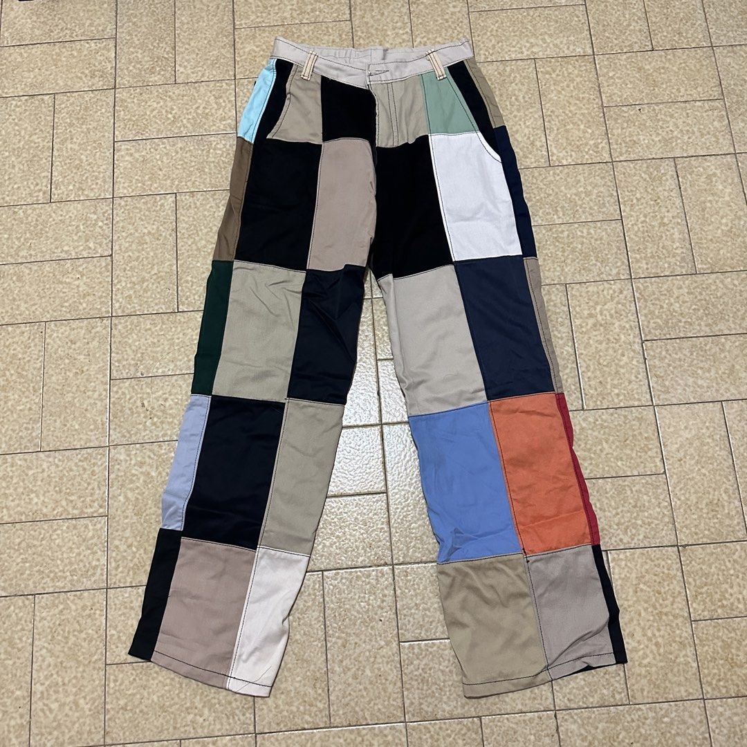 Colourblock Colourful Patchwork Pants (Category: Other Bottoms) located in Singapore. Submitted by atz99z (Listing ID 1442467173, Image 1). Description: - Waist 74cm - Unique patchwork design - Mix of colors and fabrics - Relaxed fit - Distinctive checkered pattern - Perfect for a statement outfit.