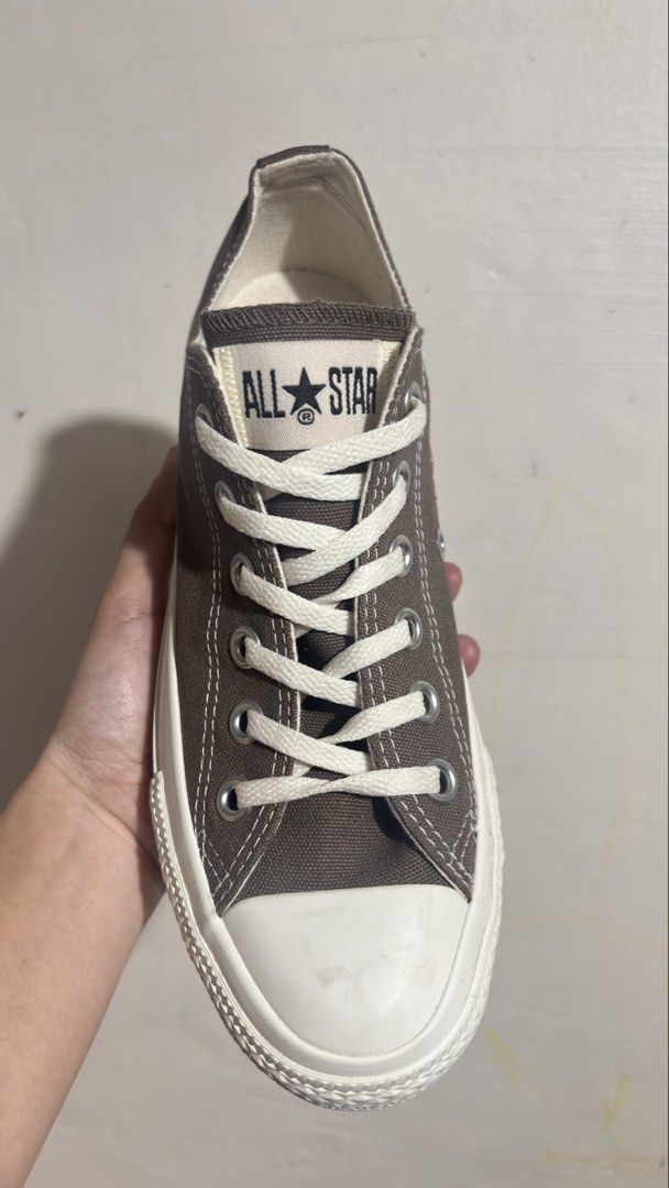 Converse All Star Low Top Sneakers Brown (Category: Sneakers) located in Taguig. Submitted by fatzy24 (Listing ID 1442520394, Image 1). Description: - Classic Converse All Star low tops - Brown canvas upper with white laces and sole - Made in Indonesia - Size: US 5 / JPN 24 - Perfect for everyday wear - Please check photos for condition details.