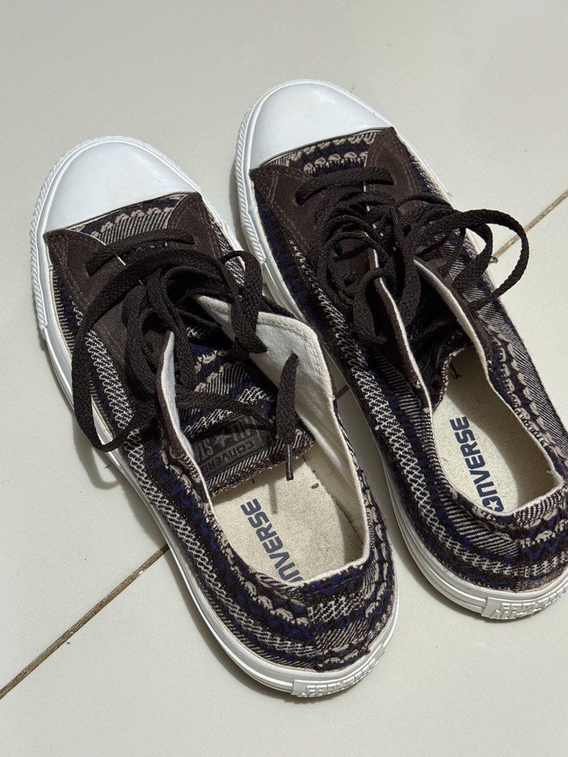 Converse Chuck Taylor All Star Brown Pattern Low Top Sneakers (Category: Sneakers) located in Calamba. Submitted by shlhs (Listing ID 1442387722, Image 1). Description: - Brown Converse Chuck Taylor All Stars - Unique patterned fabric on the sides - Lace-up style - Size 8.5 US Men's / 10.5 US Women's - Made in Vietnam.
