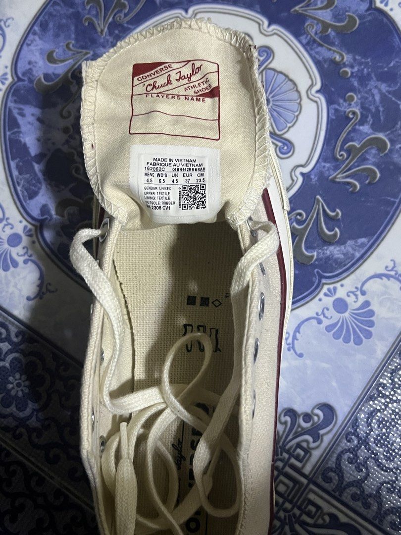 Converse Chuck Taylor All Star 70s Cream (Category: Sneakers) located in Dagupan City. Submitted by kamilpicks (Listing ID 1442406602, Image 2). Description: - Cream Converse Chuck 70s low tops - Classic canvas sneakers - Burgundy and navy stripe detail - Lace-up style - Made in Vietnam - Size: 4.5 US Women's / 37 EU / 23.5 cm.