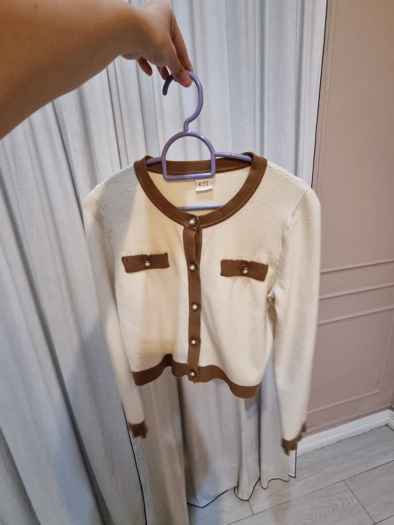 Cream & Brown Trimmed Cardigan (Category: Coats, Jackets and Outerwear) located in Quezon City. Submitted by halylauren (Listing ID 1442464228, Image 3). Description: - Cream colored cardigan - Brown trim detail - Functional front buttons - Two decorative front pockets - Long sleeves - Ideal for layering.