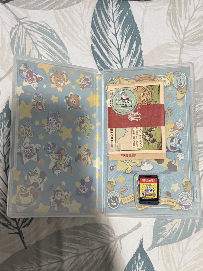 Cuphead Nintendo Switch Game (Category: Nintendo) located in Caloocan City. Submitted by error_0517 (Listing ID 1442402994, Image 2). Description: - Cuphead game for Nintendo Switch - Includes game cartridge and original case - Case features cool retro design (inside and out) - Perfect for players who enjoy a challenge.