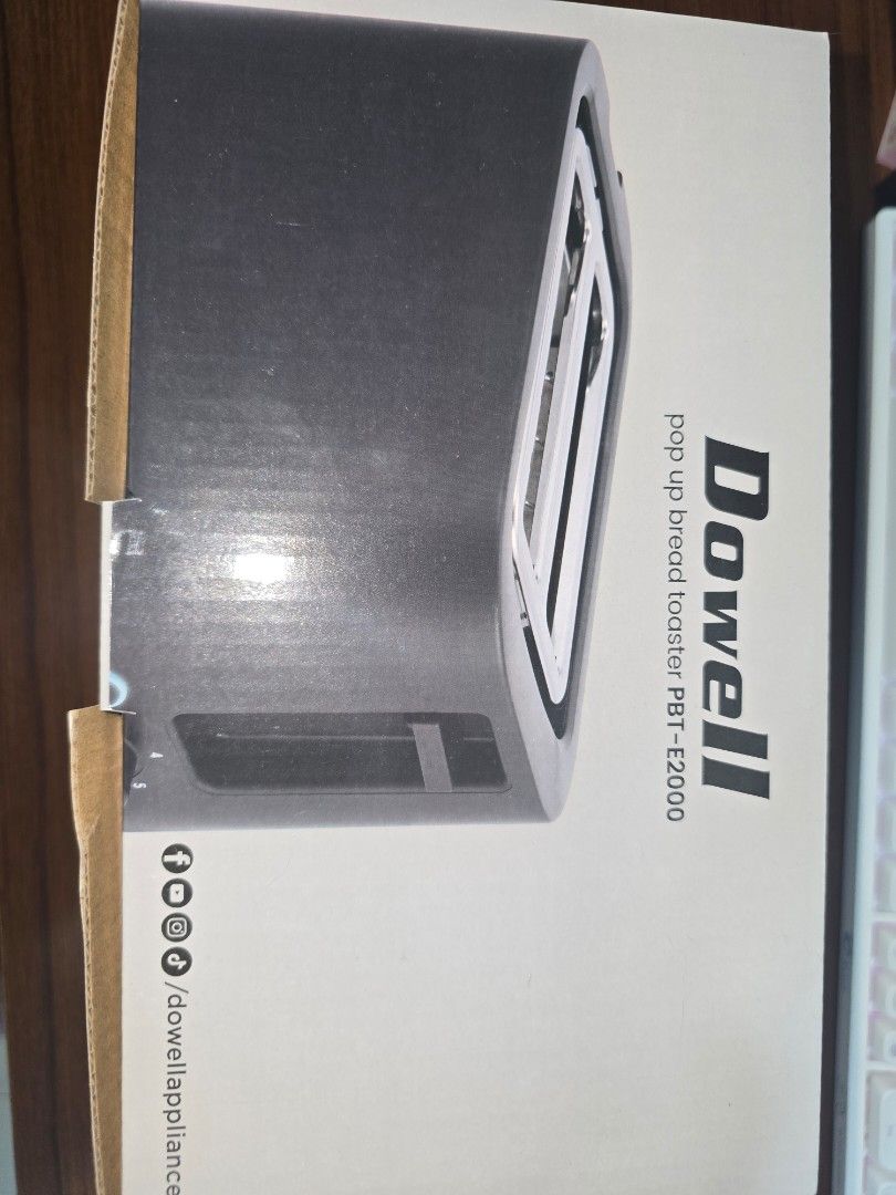 Dowell Pop Up Bread Toaster PBT-E2000 (Category: Ovens & Toasters) located in Manila. Submitted by nammie968 (Listing ID 1442409879, Image 2). Description: - Dowell Pop Up Bread Toaster (Model PBT-E2000) - Removable crumb tray for easy cleaning - Built-in dust-proof cover to keep the slots clean - Selling at low price because I have multiple in stock. Will provide discount if more than 2 are bought.