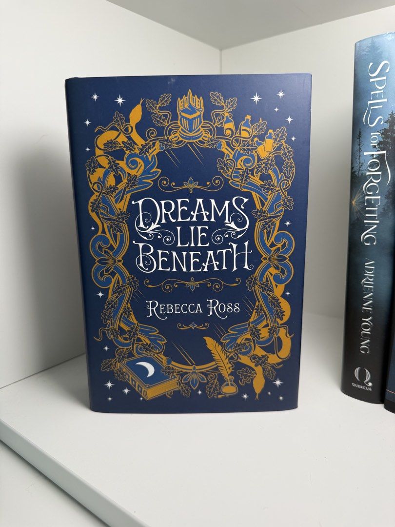 Dreams Lie Beneath - OwlCrate Exclusive Edition (Category: Storybooks) located in Muntinlupa City. Submitted by bookcozi (Listing ID 1442421612, Image 1). Description: Dreams Lie Beneath by Rebecca Ross 💜 On Hand 💜 OwlCrate Exclusive Edition 💜 Signed by Author 💜 foiled exclusive Hardcover design 💜 Author’s Letter Postcard 💜 Unread and brand new. Please expect some possible wear from storage or shipping..