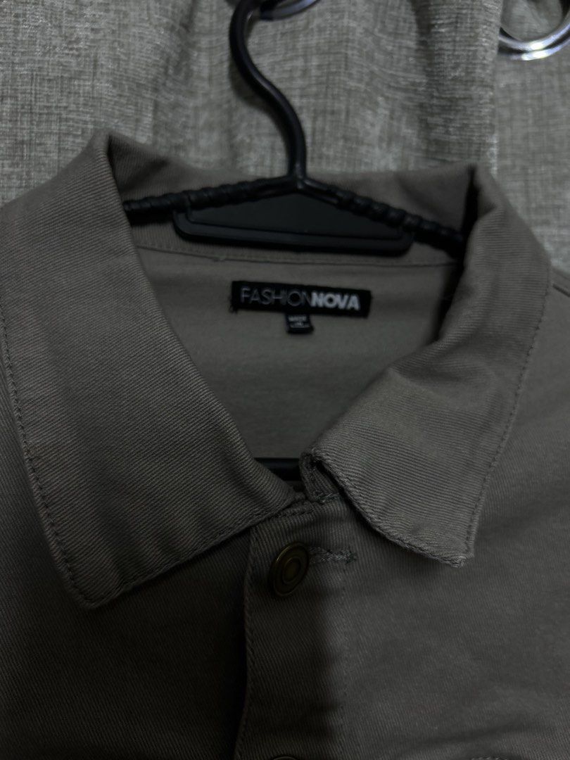 Fashion Nova Cropped Denim Jacket Grey (Category: Coats, Jackets and Outerwear) located in Manila. Submitted by yneraeiii (Listing ID 1442474026, Image 1). Description: - Grey cropped denim jacket from Fashion Nova - Features a raw hem detail - Button closure and two chest pockets - Long sleeves - Versatile piece, great with high-waisted bottoms.